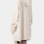 Back view of a beige oversized hoodie, designed for custom branding by a reliable streetwear hoodie manufacturer.