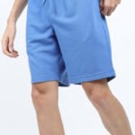 Model wearing Custom Gym Shorts Mens during a workout, YY025.
