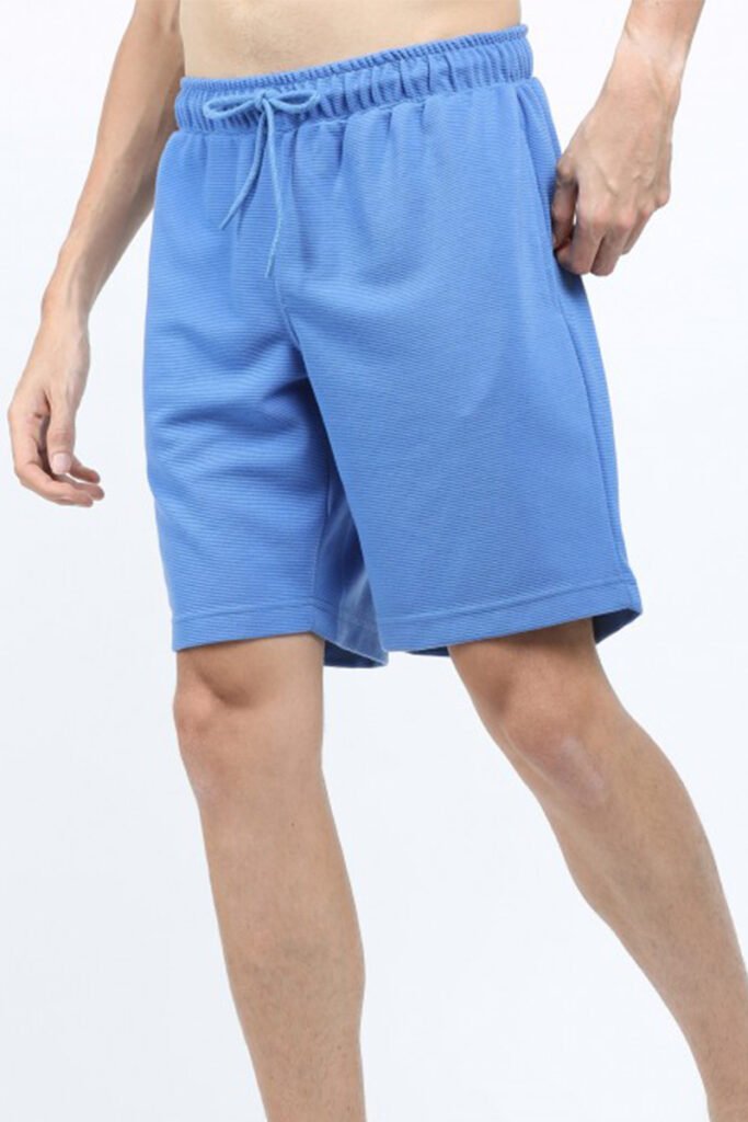 Model wearing Custom Gym Shorts Mens during a workout, YY025.