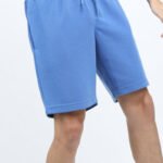 Model wearing Custom Gym Shorts Mens during a workout, YY025.