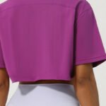 Oversized crop top workout t-shirt in purple for women.