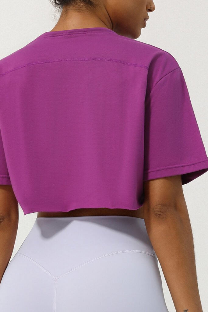 Oversized crop top workout t-shirt in purple for women.